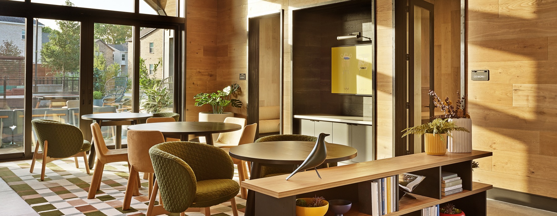 tables and chairs in an amenity clubhouse