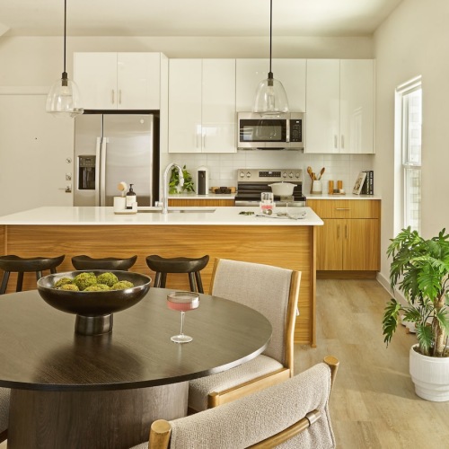 Spacious living areas to recline and recharge a living room with a large window