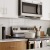 kitchen with island quartz counters, soft close cabinets 